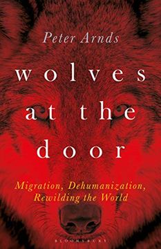 portada Wolves at the Door: Migration, Dehumanization, Rewilding the World (in English)