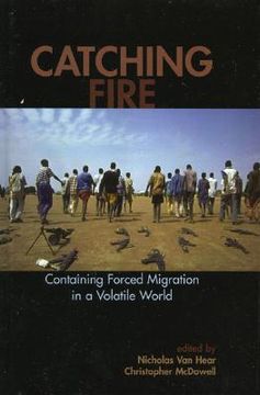 portada catching fire: containing forced migration in a volatile world (en Inglés)