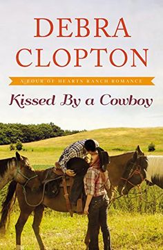 portada Kissed by a Cowboy (a Four of Hearts Ranch Romance) (en Inglés)