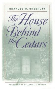 portada the house behind the cedars (in English)