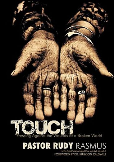 touch,pressing against the wounds of a broken world